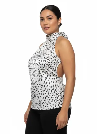 CHANDAIL ATTACHE AU COU SANS MANCHE BLANC TACHETE NOIR